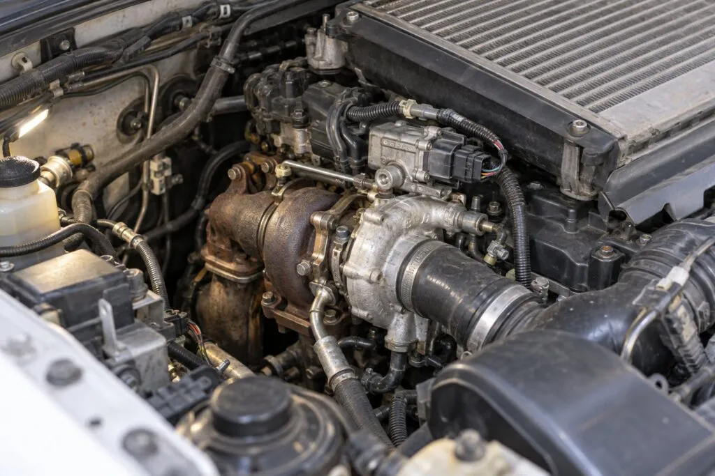 Toyota 1KD-FTV 3.0L Turbocharger Guide: Hilux, Land Cruiser & Prado Applications 23 CT16V turbo installed beside the 1KD-FTV engine in a Toyota Hilux N70 engine bay