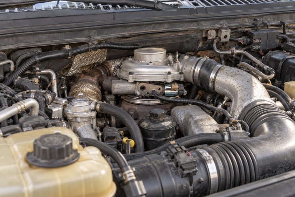 Ford 6.0L Powerstroke Turbocharger Replacement Cost: Full Price Breakdown 2 Garrett GT3782VA installed at the rear of a Ford Super Duty 6.0L Powerstroke engine bay